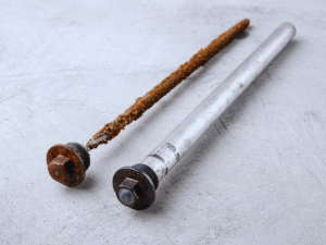 Two anode rods, one intact the other rusted